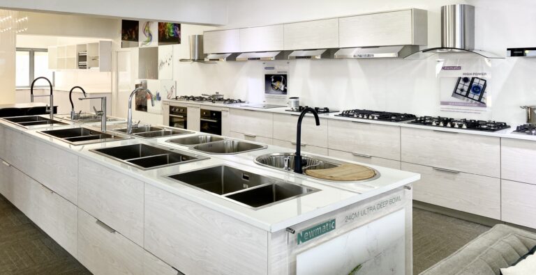 Range of sinks and taps for sale in Newmatic's Kellico Complex showroom.