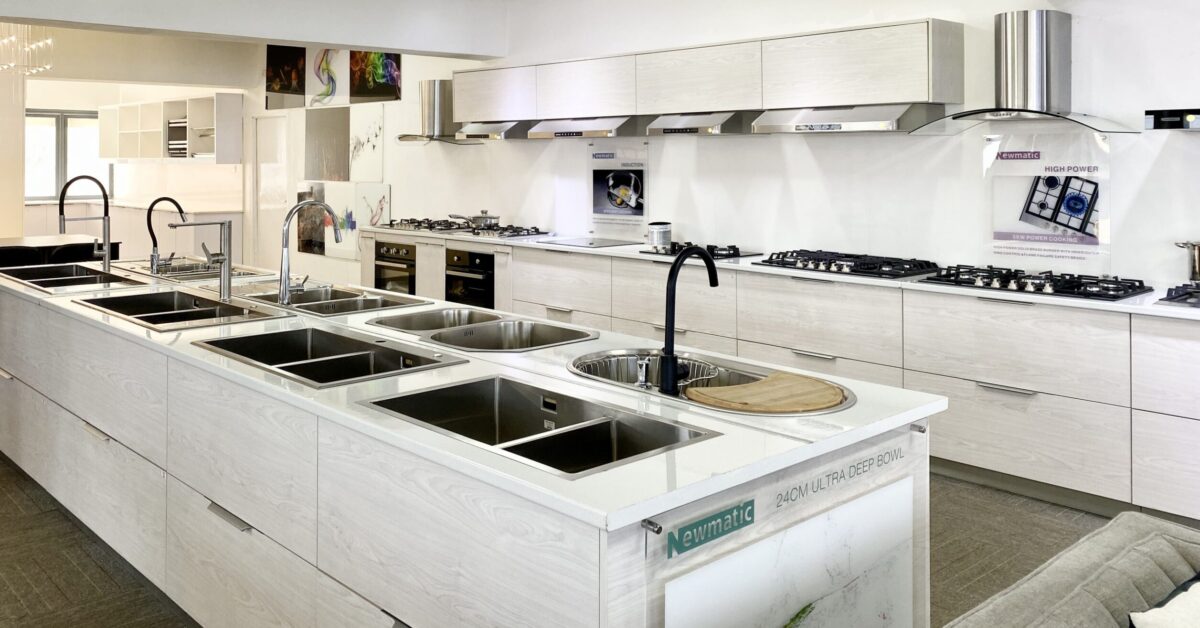 Range of sinks and taps for sale in Newmatic's Kellico Complex showroom.