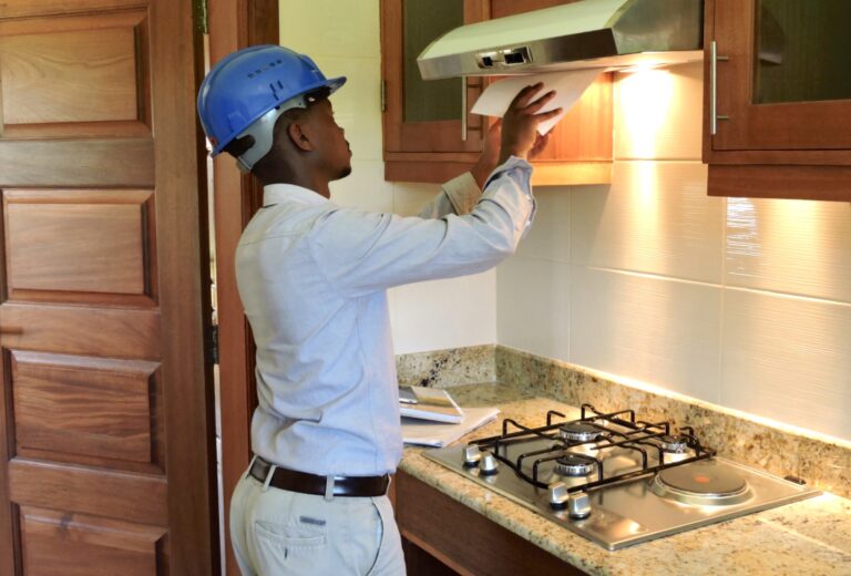 A Technician Repairing A Slim Hood