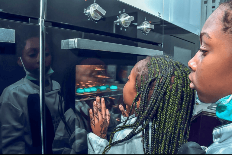 Children looking at Newmatic Built-in Oven