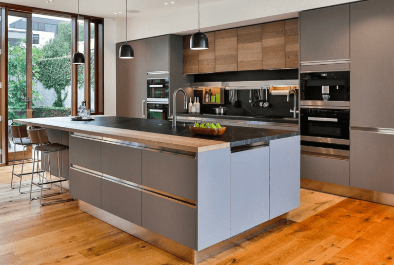 Modern kitchen with built-in microwave and electric oven.