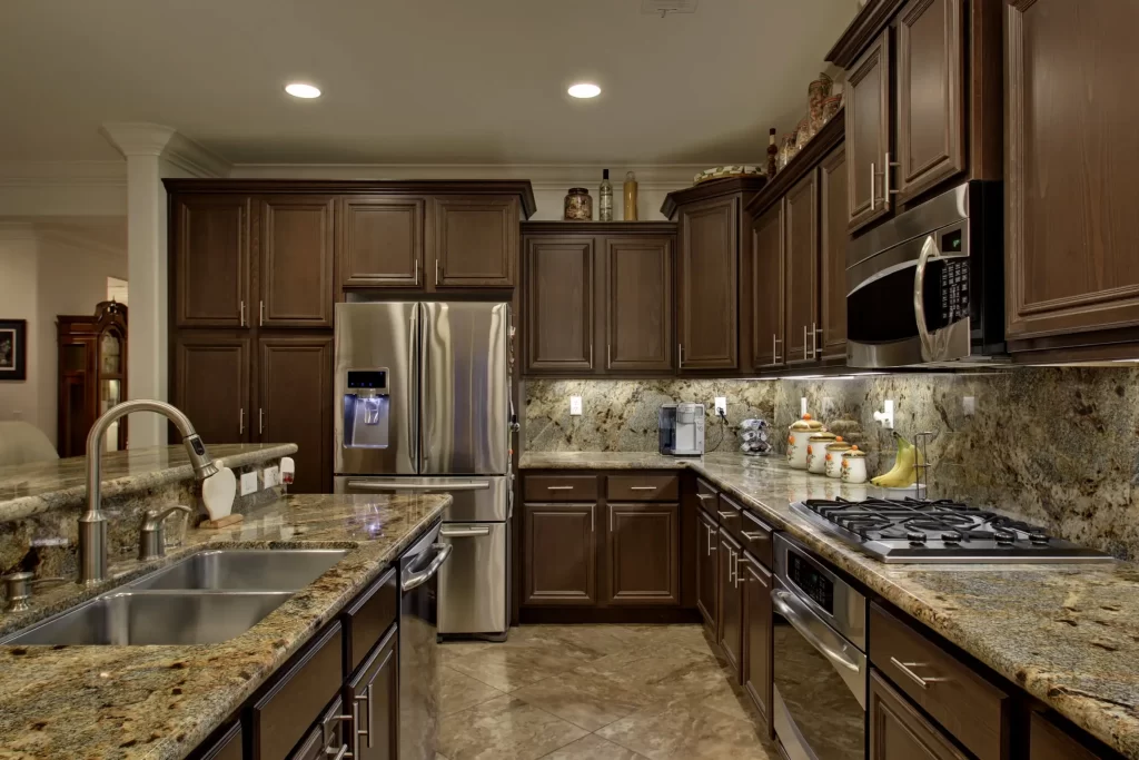 A Premium Kitchen Design with Builtin Fridge and Stainless Steel Cooker