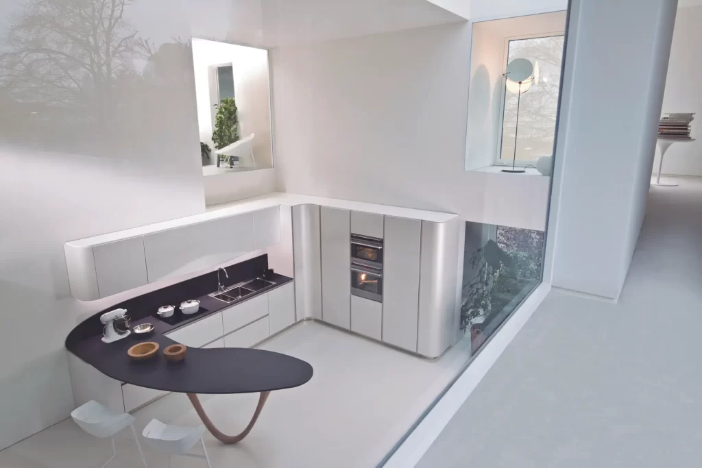 A Small Kitchen Design featuring Inbuilt Ovens, Sinks and Taps