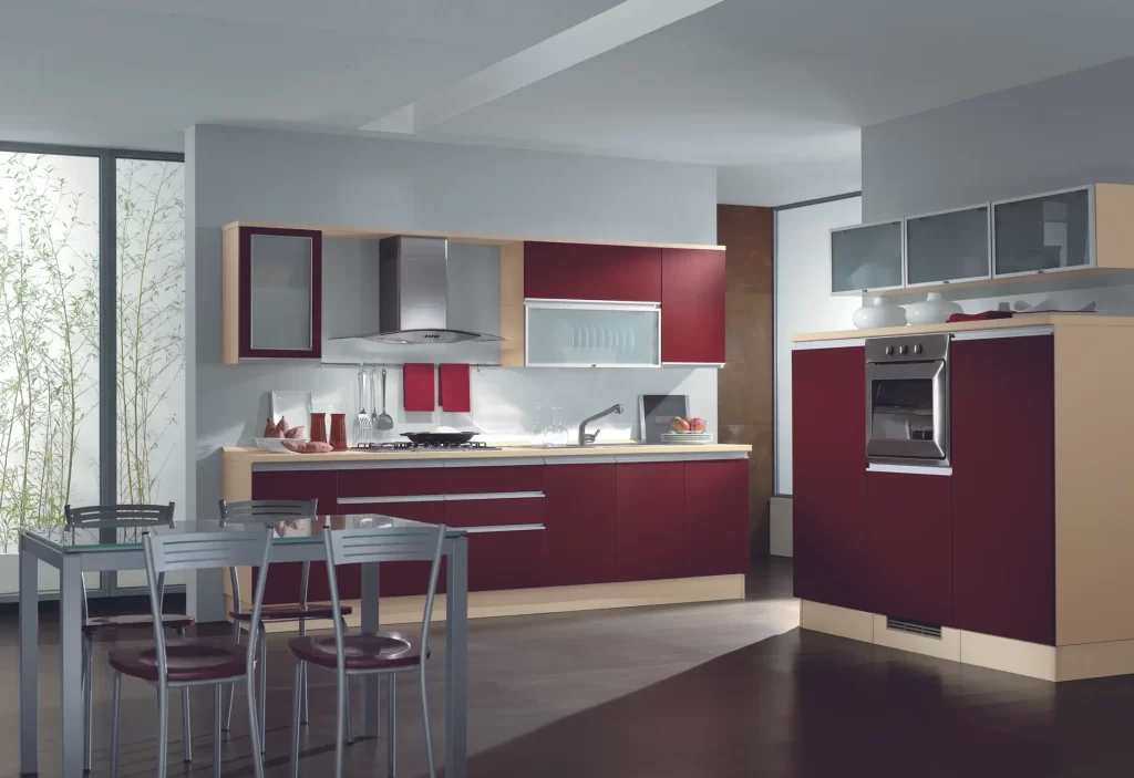 A Small Kitchen Design with Wall Hood, Built-in Cooker and Oven