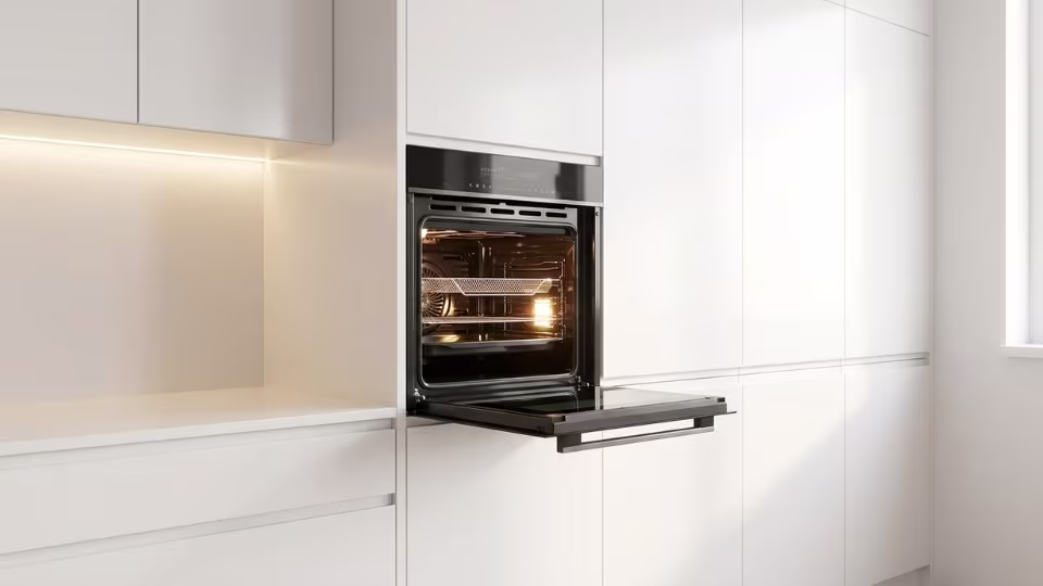 Newmatic built-in electric oven with inbuilt Airfryer installed in kitchen cabinetry