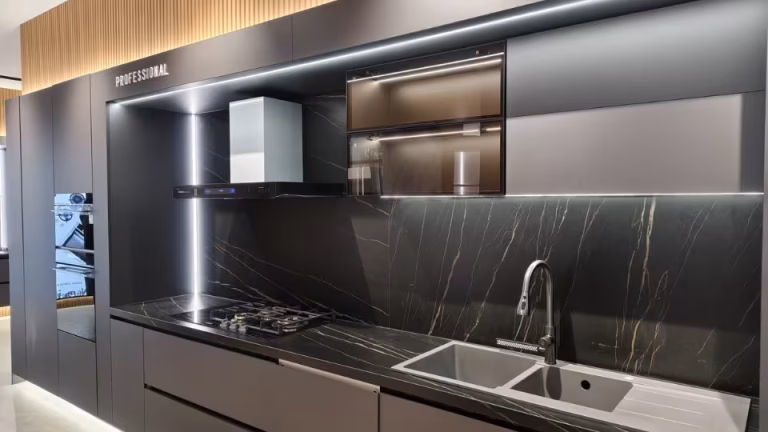 Newmatic kitchen appliance showroom; built-in hobs, hoods, and ovens on display